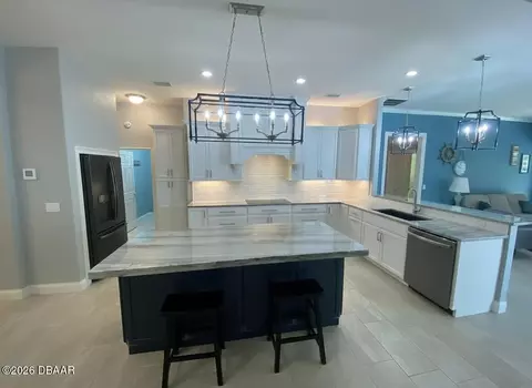 Kitchen - 1452 Pecos Dr, Ormond Beach, FL 32174 photo 3 of 7