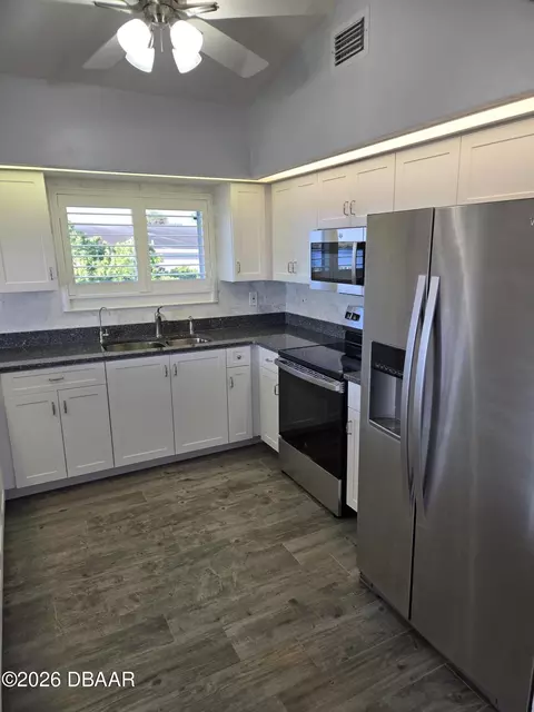 Kitchen - 981 Shockney Dr, Ormond Beach, FL 32174 photo 2 of 7