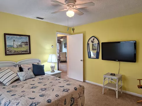 Bedroom - 2707 Pine Tree Dr, Edgewater, FL 32141 photo 2 of 3
