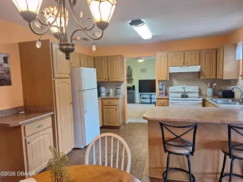 Kitchen - 2707 Pine Tree Dr, Edgewater, FL 32141 photo 4 of 4