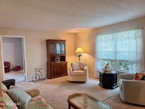 Living - 2707 Pine Tree Dr, Edgewater, FL 32141 photo 1 of 5