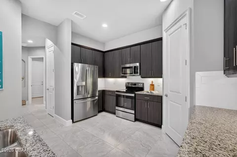 Kitchen - 823 Pinewood Dr, Ormond Beach, FL 32174 photo 3 of 4