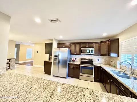 Kitchen - 123 Rio Pinar Dr, Ormond Beach, FL 32174 photo 3 of 4