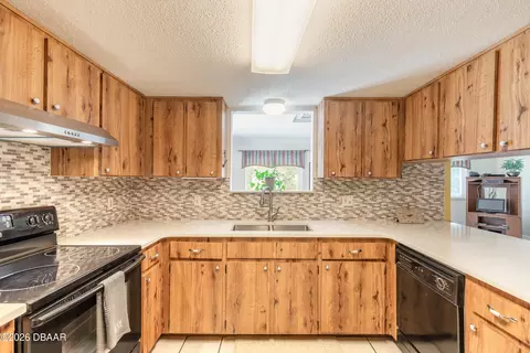 Kitchen - 1820 Pine Tree Dr, Edgewater, FL 32132 photo 2 of 3