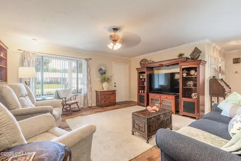 Living - 1820 Pine Tree Dr, Edgewater, FL 32132 photo 1 of 5