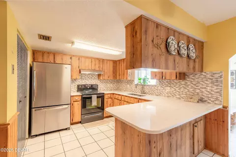 Kitchen - 1820 Pine Tree Dr, Edgewater, FL 32132 photo 1 of 3