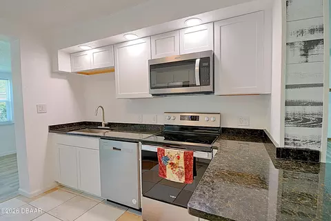 Kitchen - 59 Hibiscus Dr, Ormond Beach, FL 32176 photo 2 of 4