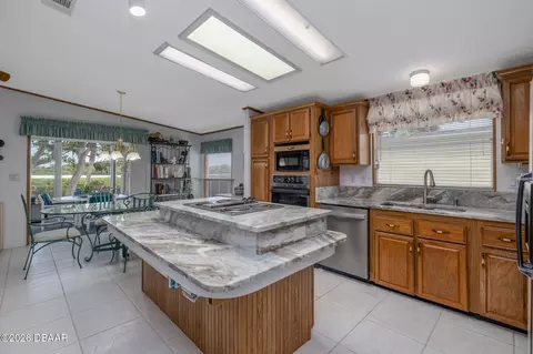Kitchen - 735 Navigators Way, Edgewater, FL 32141 photo 2 of 5