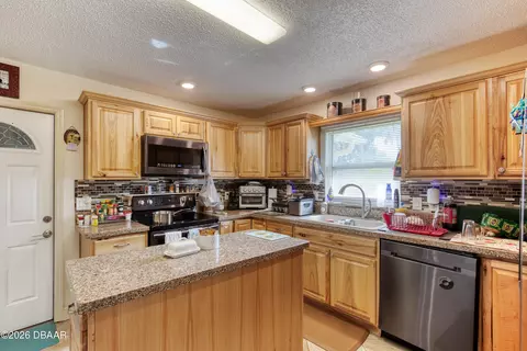 Kitchen - 1812 Mango Tree Dr, Edgewater, FL 32132 photo 3 of 4