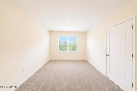 Bedroom - 21 Melogold Dr, Ormond Beach, FL 32174 photo 5 of 9