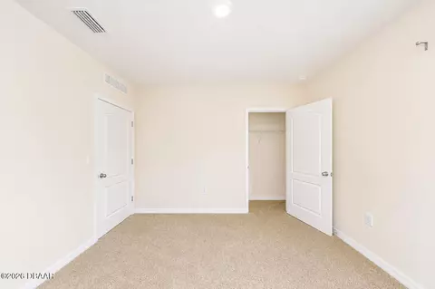 Bedroom - 21 Melogold Dr, Ormond Beach, FL 32174 photo 4 of 9