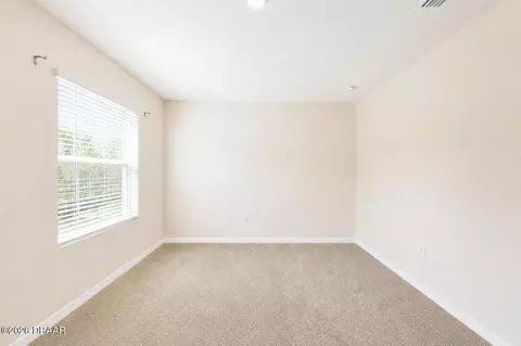 Bedroom - 21 Melogold Dr, Ormond Beach, FL 32174 photo 3 of 9