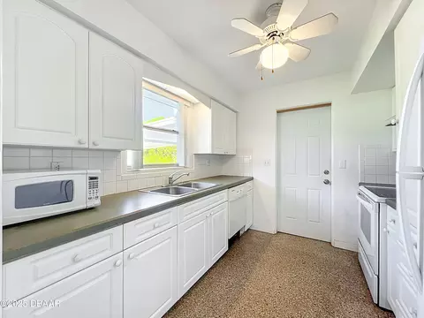 Kitchen - 1401 Orange Tree Dr, Edgewater, FL 32132 photo 1 of 6