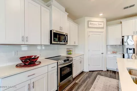 Kitchen - 345 E Merimont Ln E, Ormond Beach, FL 32174 photo 4 of 5