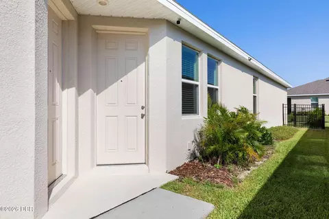 Exterior - 345 E Merimont Ln E, Ormond Beach, FL 32174 photo 10 of 11