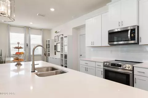 Kitchen - 345 E Merimont Ln E, Ormond Beach, FL 32174 photo 7 of 8