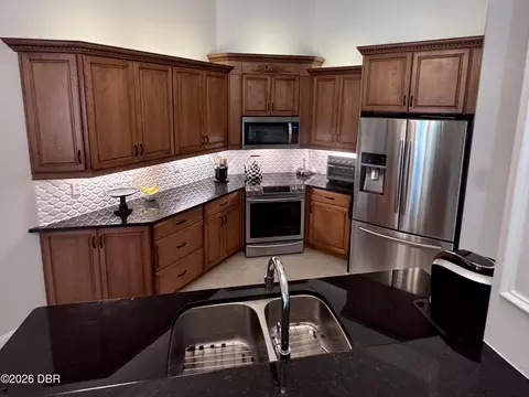 Kitchen - 3448 Acoma Dr, Ormond Beach, FL 32174 photo 8 of 9