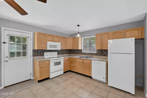 Kitchen - 2811 Umbrella Tree Dr, Edgewater, FL 32141 photo 2 of 2