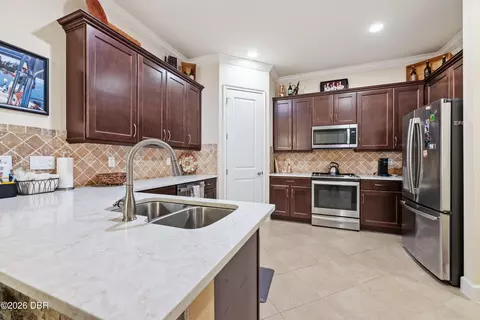 Kitchen - 817 Pinewood Dr, Ormond Beach, FL 32174 photo 2 of 5