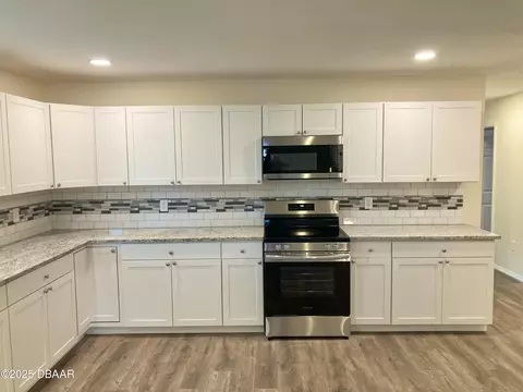 Kitchen - 2129 Lime Tree Dr, Edgewater, FL 32141 photo 6 of 7