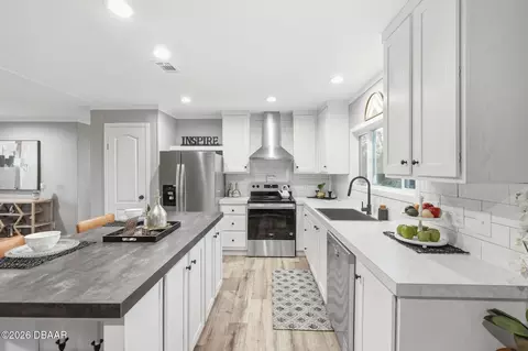 Kitchen - 1913 Woodcrest Dr, Ormond Beach, FL 32174 photo 2 of 4