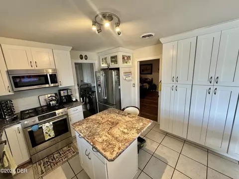 Kitchen - 153 University Cir, Ormond Beach, FL 32176 photo 2 of 4