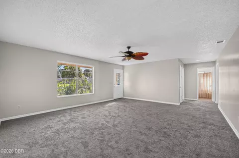 Living - 2932 Pine Tree Dr, Edgewater, FL 32141 photo 2 of 3