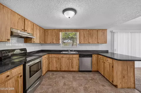 Kitchen - 2932 Pine Tree Dr, Edgewater, FL 32141 photo 1 of 2