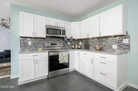 Kitchen - 215 Cumberland Ave, Ormond Beach, FL 32174 photo 2 of 3