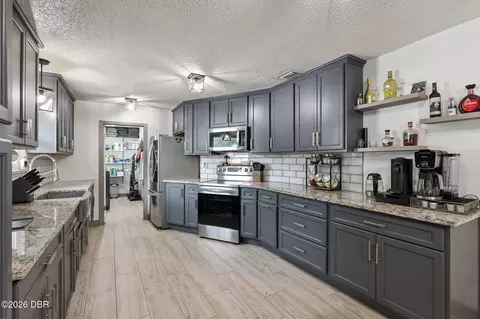 Kitchen - 1629 Orange Tree Dr, Edgewater, FL 32132 photo 5 of 5