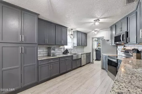 Kitchen - 1629 Orange Tree Dr, Edgewater, FL 32132 photo 3 of 5