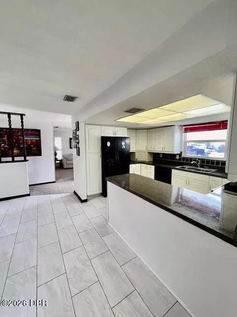 Kitchen - 33 Wisteria Dr, Ormond Beach, FL 32176 photo 2 of 3