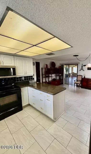 Kitchen - 33 Wisteria Dr, Ormond Beach, FL 32176 photo 3 of 3