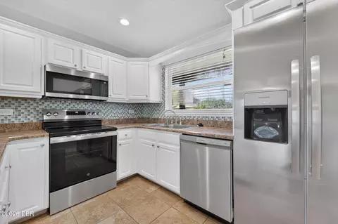 Kitchen - 911 Woodmere Cir, Ormond Beach, FL 32174 photo 1 of 2