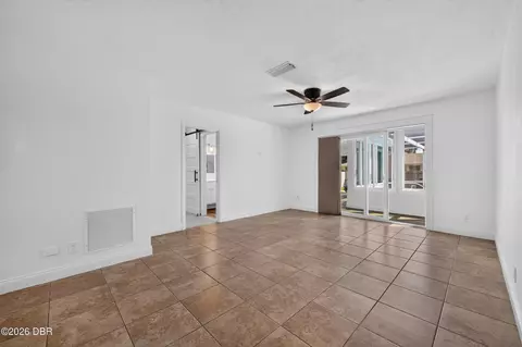 Living - 911 Woodmere Cir, Ormond Beach, FL 32174 photo 3 of 5