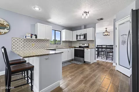 Kitchen - 1613 Juno Trl, Astor, FL 32102 photo 2 of 4