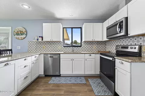 Kitchen - 1613 Juno Trl, Astor, FL 32102 photo 3 of 4