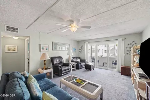 Living - 1926 Ocean Shores Blvd, Ormond Beach, FL 32176 photo 1 of 3