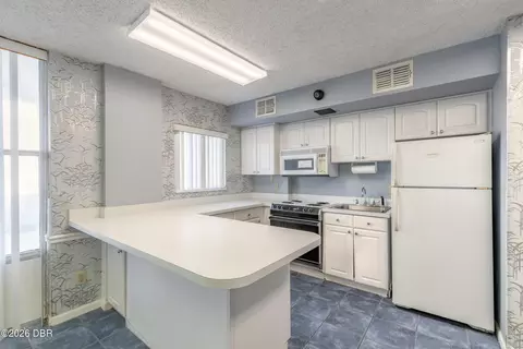 Kitchen - 1575 Ocean Shore Blvd, Ormond Beach, FL 32176 photo 4 of 4