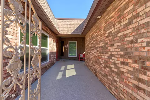 Exterior - 104 Rio Pinar Dr, Ormond Beach, FL 32174 photo 7 of 17