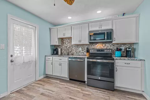 Kitchen - 52 Tropical Dr, Ormond Beach, FL 32176 photo 2 of 3