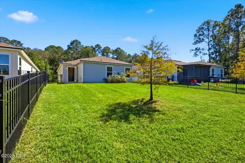 Exterior - 80 Bogey Pl, Bunnell, FL 32110 photo 5 of 8