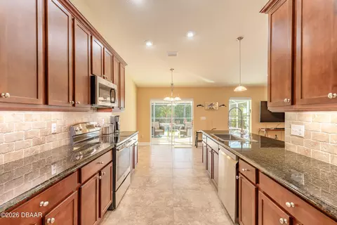 Kitchen - 369 Chelsea Place Ave, Ormond Beach, FL 32174 photo 4 of 5