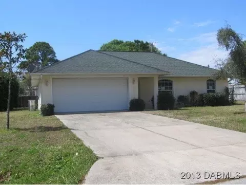 3310 Pine Tree Dr, Edgewater, FL 32141 photo 1