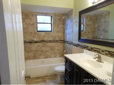 3227 Pine Tree Dr, Edgewater, FL 32141 photo 5