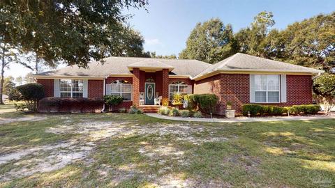 5566 Whispering Woods Dr, Pace, FL 32571 photo 1