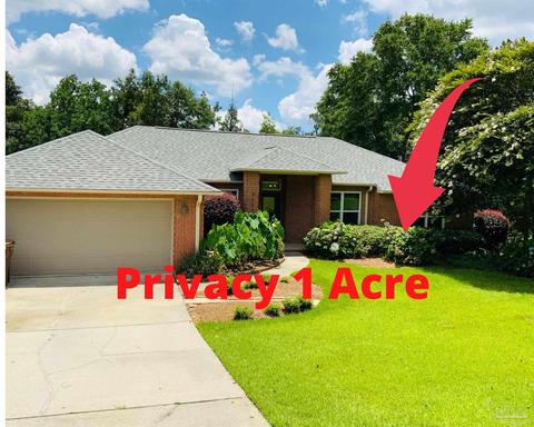 5585 Whispering Woods Dr, Pace, FL 32571 photo 1
