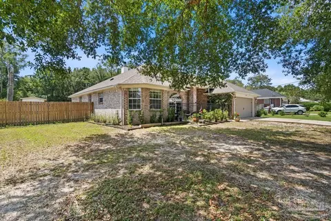 5605 Whispering Woods Dr, Pace, FL 32571 photo 4