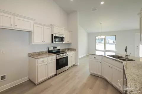 Kitchen - 5669 Old Stone Blvd, Milton, FL 32570 photo 3 of 3