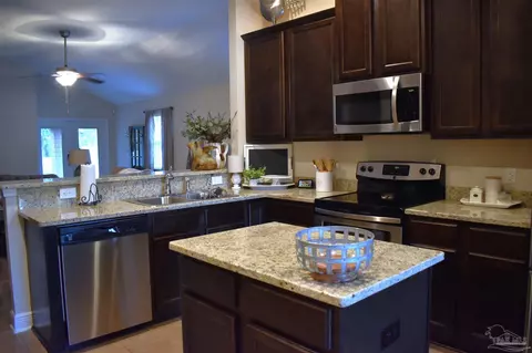 Kitchen - 6101 Dunridge Dr, Pace, FL 32571 photo 3 of 8